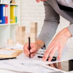 El método de organización de los agentes inmobiliarios Élite - Fuente foto Magnific